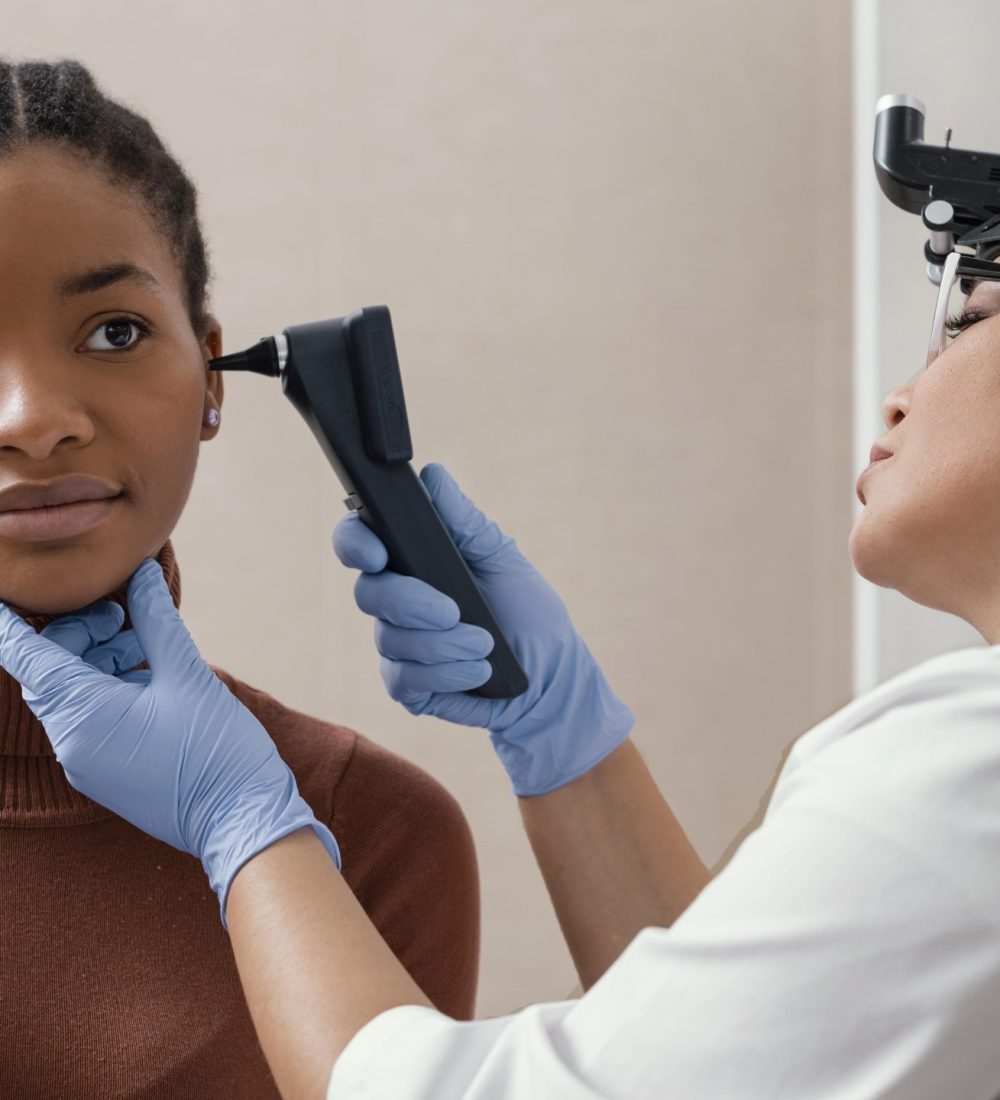medium-shot-doctor-checking-patient-ears